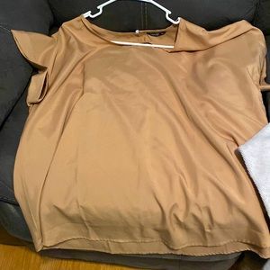 Gold silk shirt and gray sweater